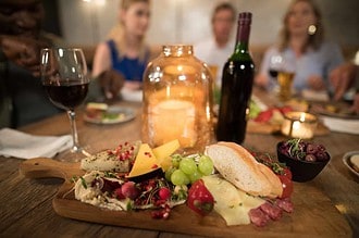 Various food and drink on dining table in restaurant