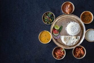 Authentic Indian spices and ingredients on a dark background.