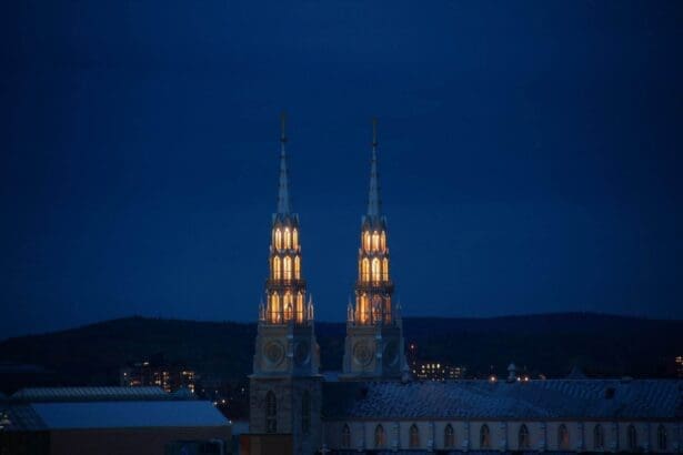 Illuminated church spires at night in Ottawa.
