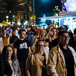 Crowded street in Toronto at night.