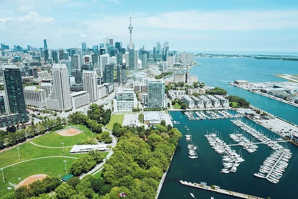Aerial view of Toronto skyline and waterfront.